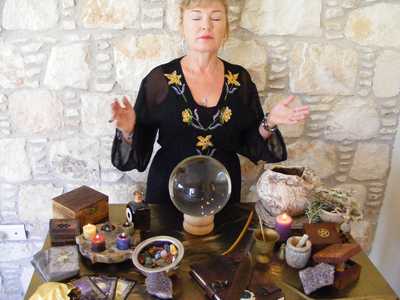 Woman Casting a Spell at her Altar