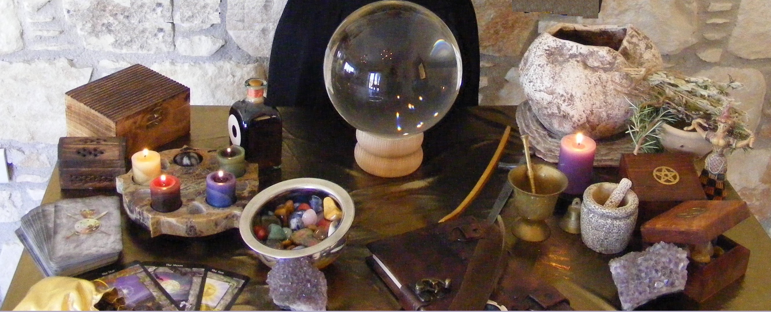 My Altar with Tarot cards, Candles, Oil, Crystals, Amethyst Cluster, Crystal Ball, Cauldron, Goddess, Pentagram, Pestle and Mortar, Summoning Bell, Ceremonial Knife, Eagle’s Feather, Book of Shadows