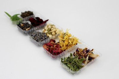 Dried herbs in small dishes