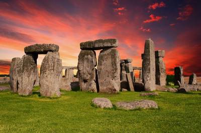 Stonehenge under a red sky.