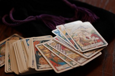 Tarot cards spread on a velvet cloth.