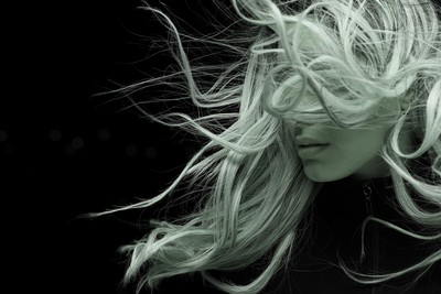 A woman's long hair blowing in the wind