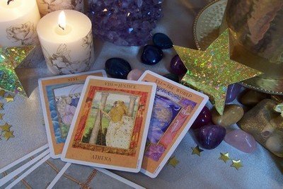 3 Tarot Cards on a Table.