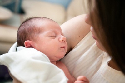 Mother holding her baby
