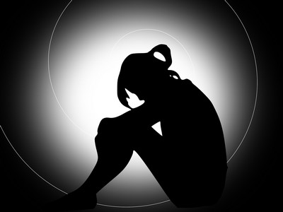 Sillouette of woman depressed