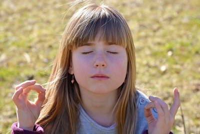 Young woman concentrating on Affirming