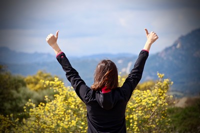 woman with outstretched arms