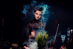 Young Woman shrouded in mystical smoke