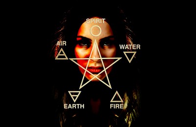 A pentacle superimposed over a woman's face